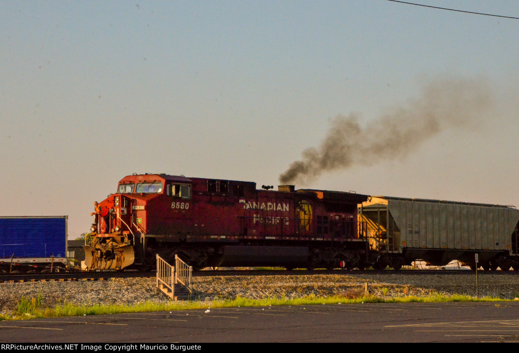 CP AC44CW Locomotive leading a train